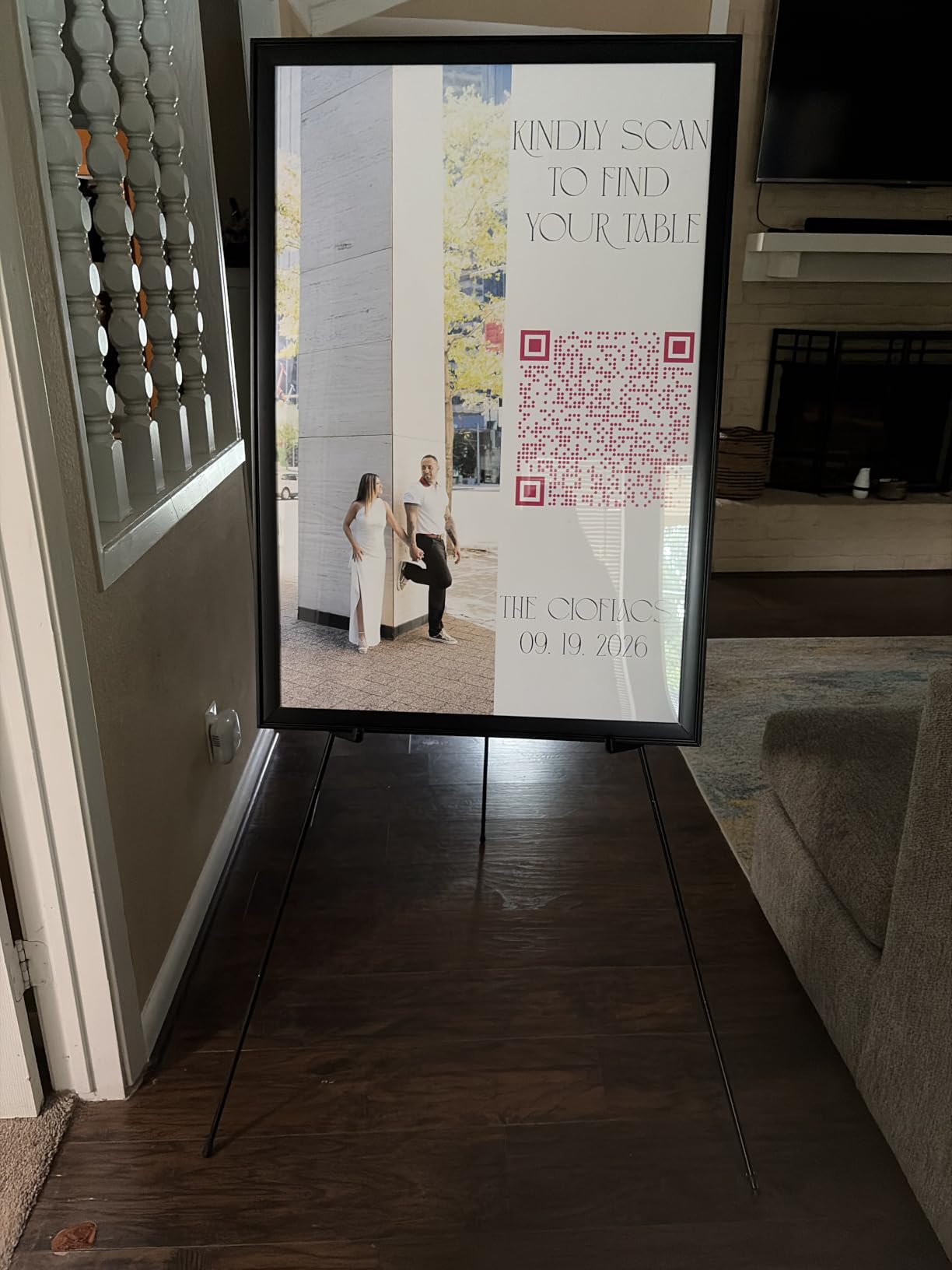 Amazon Basics Easel Display Stand, Instant Floor Poster, Lightweight, Collapsible and Portable with Tripod Base, Black Steel (supports 5 pounds) customer photo 2
