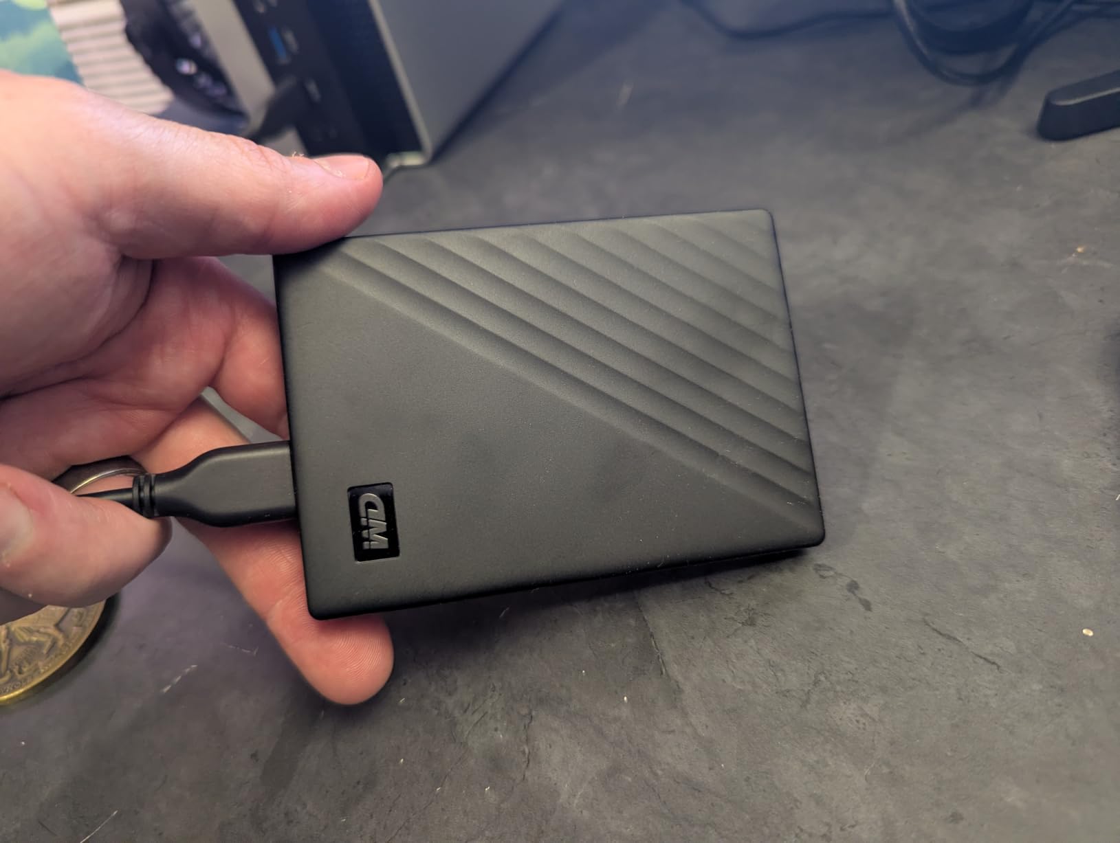 WD 2TB My Passport, Portable External Hard Drive, Black, backup software with defense against ransomware, and password protection, USB 3.1/USB 3.0 compatible - WDBYVG0020BBK-WESN customer photo 2