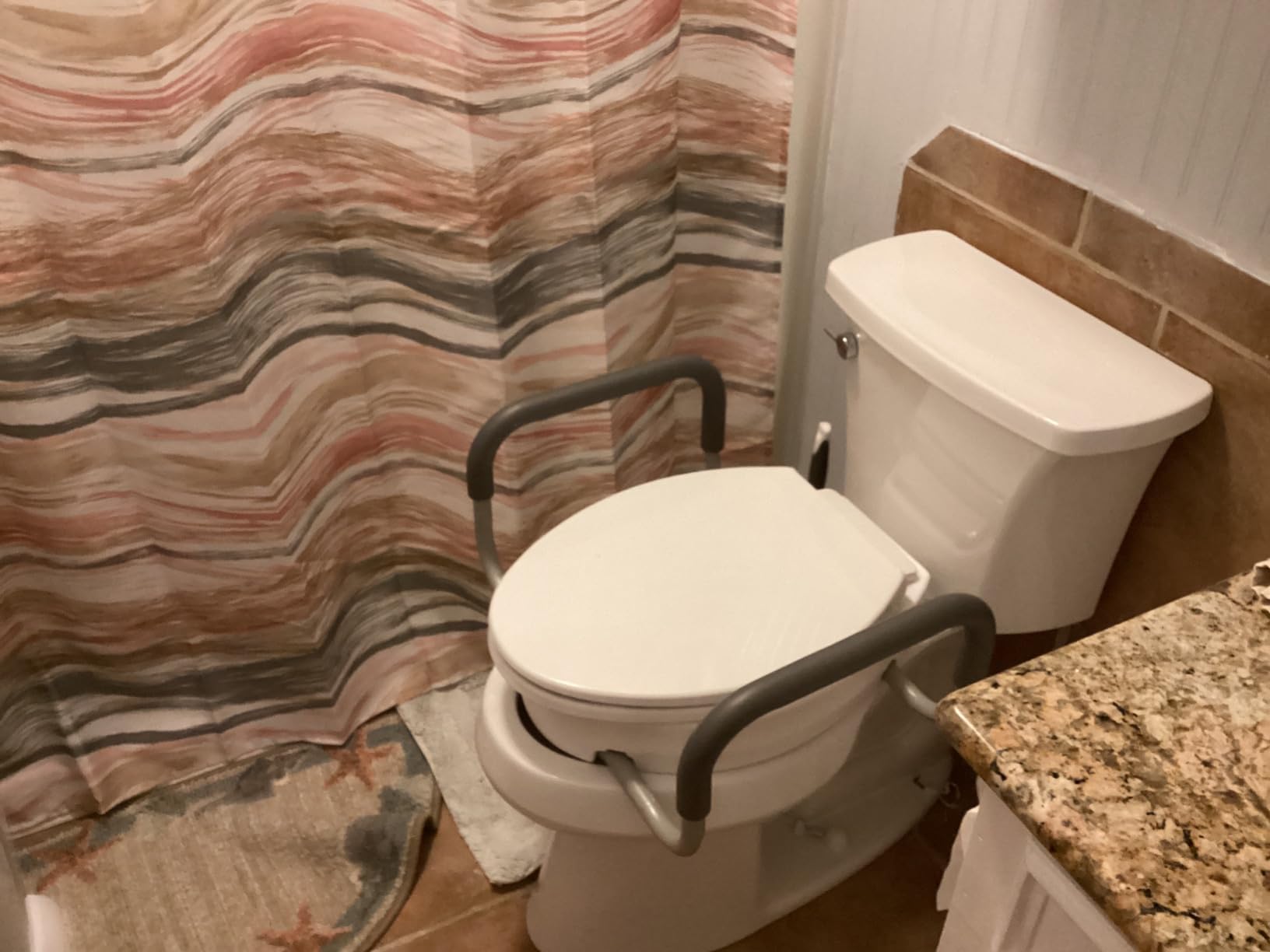 Carex 3.5 Inch Raised Toilet Seat with Arms, Round Toilet Seat Riser, 300 lbs Capacity, Elevating and Raising Seat for Elderly and Handicap, Universal, Slip-Resistant with Padded Handles, White customer photo 2