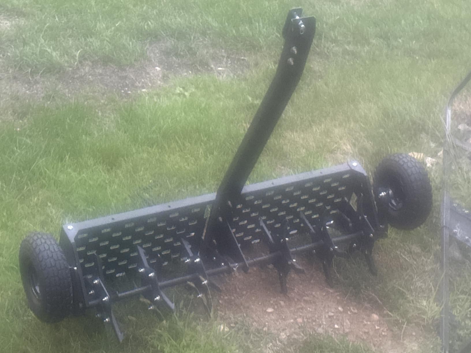 Garvee 48-Inch Tow Behind Plug Aerator,Pull Behind Aerator with Durable Steel Tines Lawn & Tray and Pneumatic Tires Tow Behind Spike Aerator for Lawn, Farm,Planting,Green customer photo 2